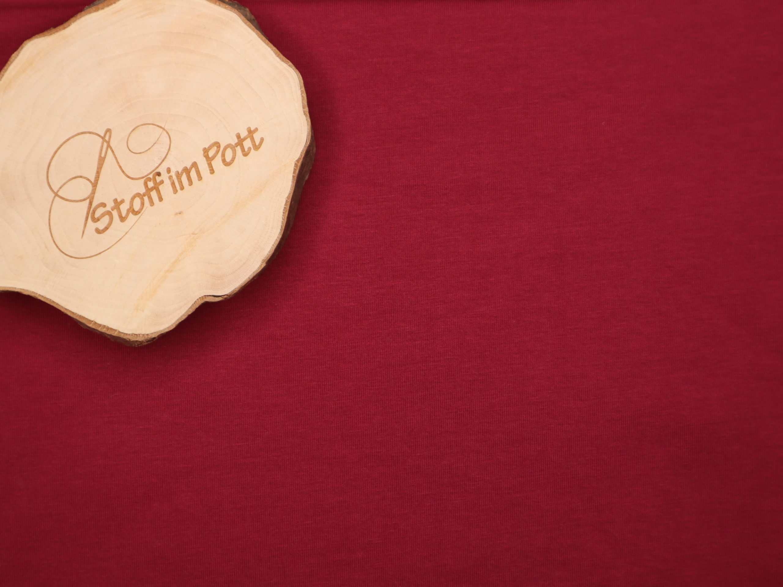 Baumwolljersey Uni beere (dunkler als auf dem Foto!)